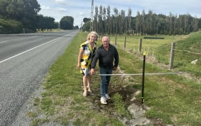 Local resident Tony Drozdzak and MP Ingrid Leary say the new power poles will be dangerous.