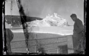 Alexander Stevens on the deck of the Aurora at McMurdo Sound in Antarctica.