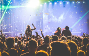 Young people dancing at night club - Hands up and multicolored confetti at nightclub after party - Nightlife concept with afterparty crowd celebrating dj concert festival event - Retro contrast filter