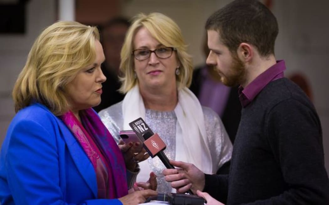 Justice Minister talks to the media, including Radio New Zealand political reporter Craig McCulloch.