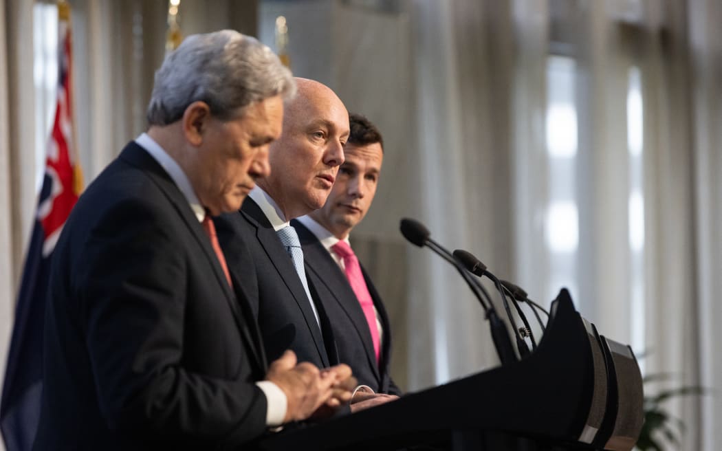 Coalition agreement signing ceremony between Christopher Luxon, David Seymour and Winston Peters.