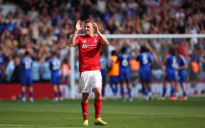 Chris Wood acknowledges the fans after the draw in the Premier League match between Nottingham Forest FC and Leicester City FC at City Ground.