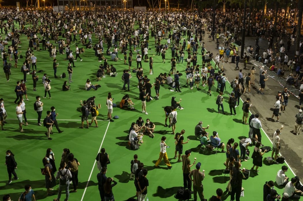 People respecting the social distancing rules during the Tiananmen Square vigil remembrance in Causeway Bay, Hong Kong.