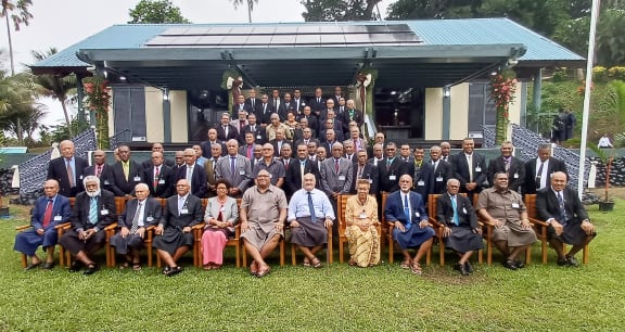 The interim membership of Fiji's Great Council of Chiefs pose for a photo after the reinstatement of the premier indigenous institution on Bau Island. 24 May 2023