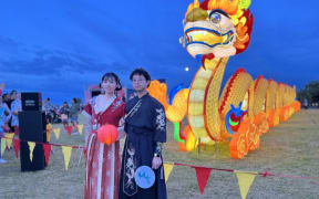 Auckland Lantern Festival, Minrui Yang (left) originally from China, opts for ancient Chinese attire Hanfu, to evoke a sense of nostalgia.