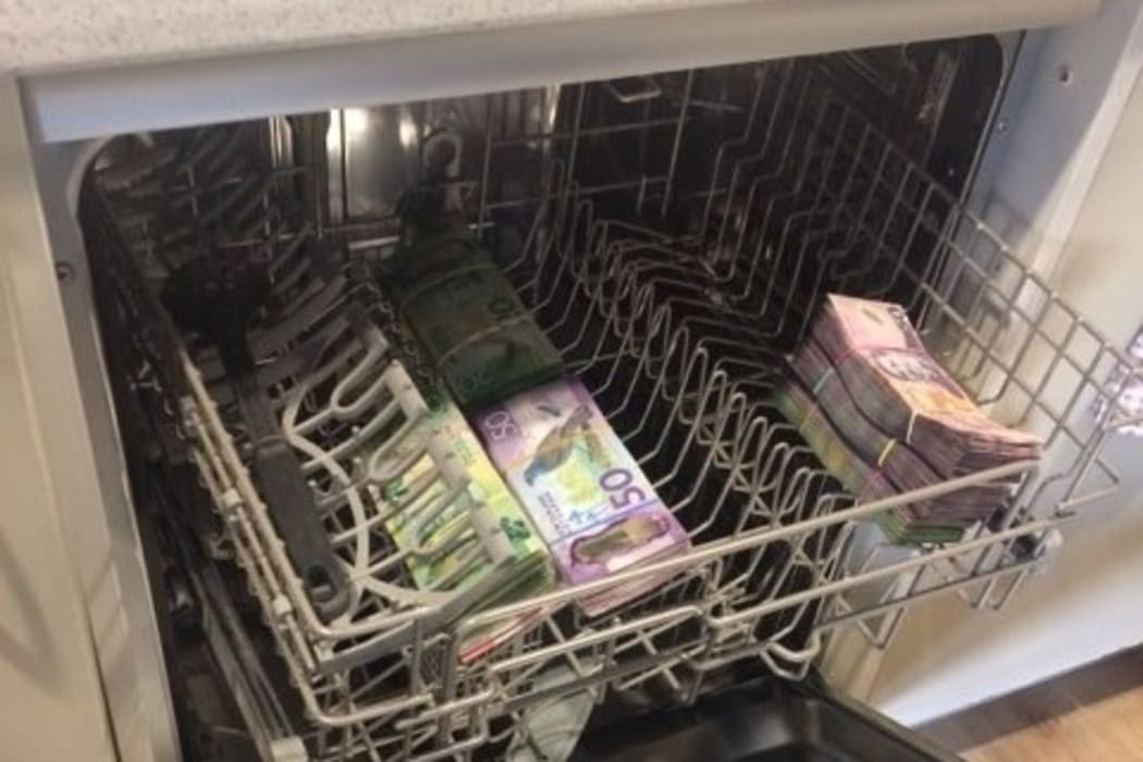 A dishwasher was found to have cash inside.