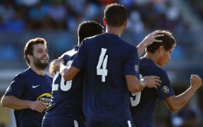 Auckland FC celebrate David Browne's penalty.