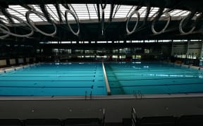 This photograph taken in Limoges on September 6, 2022 shows the pool of the Aquapolis water park, which is temporarily closed due to high energy prices. (Photo by PASCAL LACHENAUD / AFP)