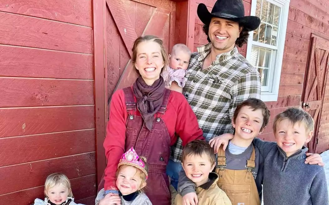 Hannah and Daniel Neeleman with their eight children.