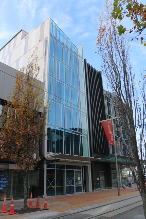230 High Street Christchurch is the narrow, glass-fronted building in the centre.