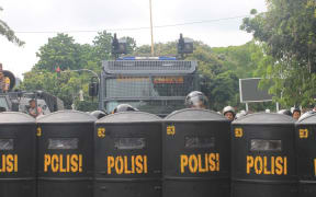 Indonesian police at a demonstration in the Papuan region.