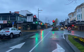 A quiet Hamilton street on Monday as part of the Waikato region starts five days of alert level 3 following two community cases of Covid-19.