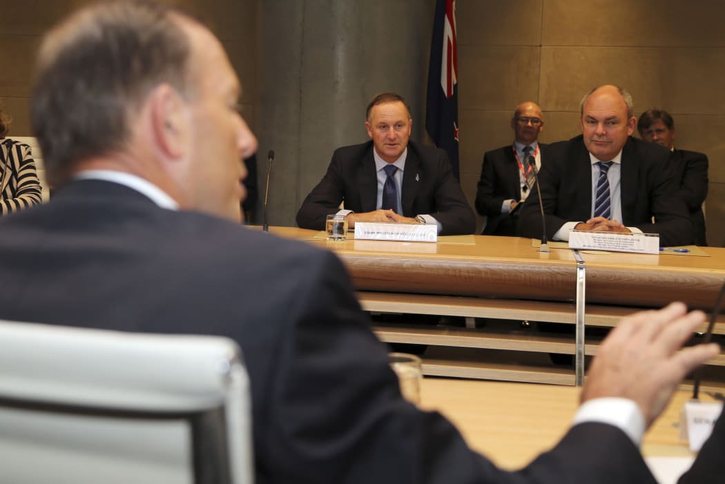 New Zealand Prime Minister John Key (centre) and Minister Steven Joyce (right) list to Australian Prime minister Tony Abbott.