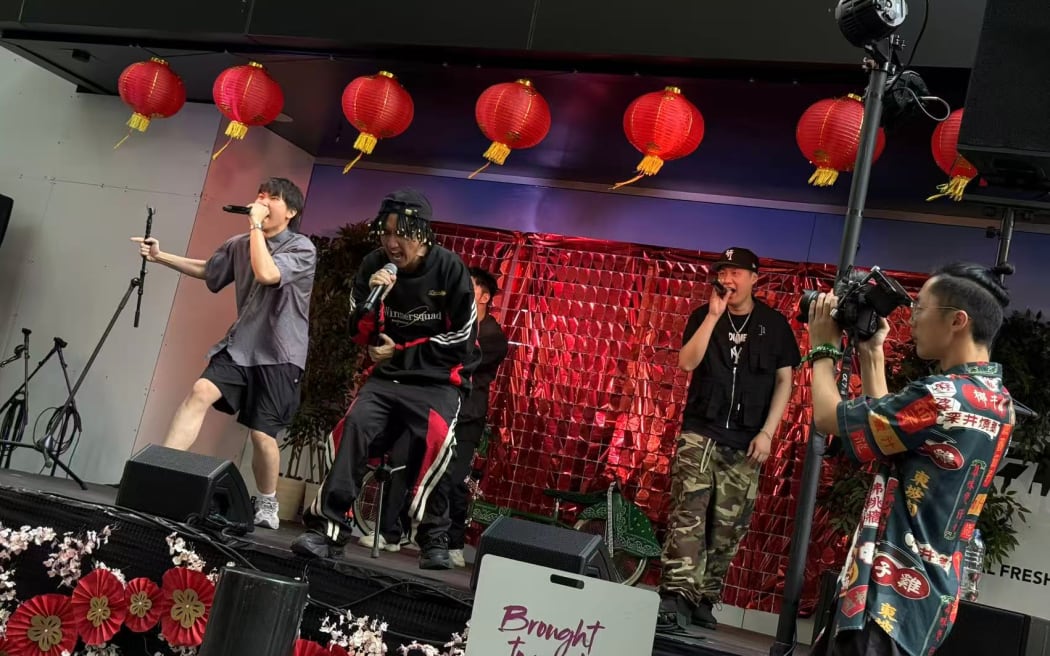 AKLA is an Auckland-based Chinese hip-hop fusion collective with 16 members aged between 20 and 40.