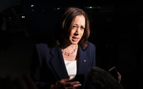 US Vice President Kamala Harris speaks before departing for travel to Southeast Asia, her first trip to this region as vice president to meet with government, private sector, and civil society leaders, at Joint Base Andrews in Maryland, 20 August 2021.