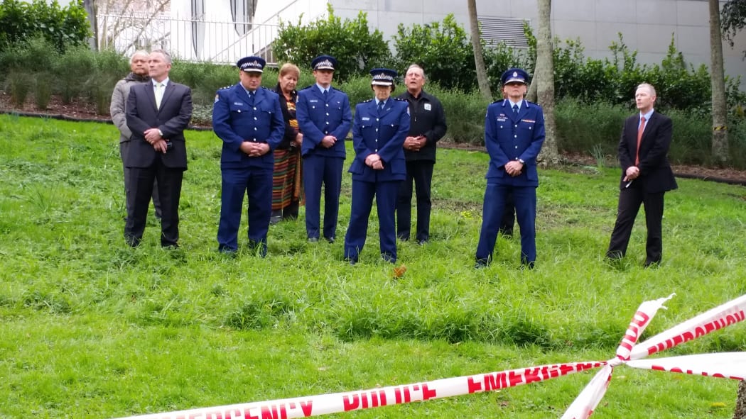Police and members of the public at Myers Park, where David Cerven was shot and killed by police on Sunday.