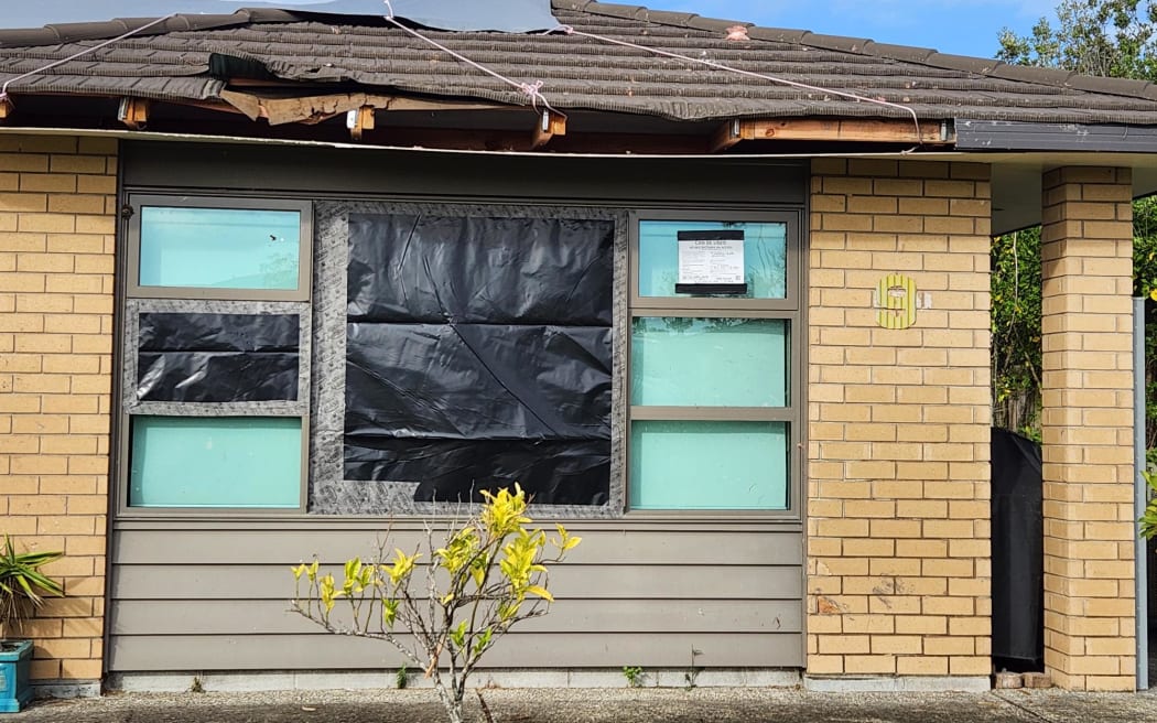 A white-stickered home on Old Waipu Road.