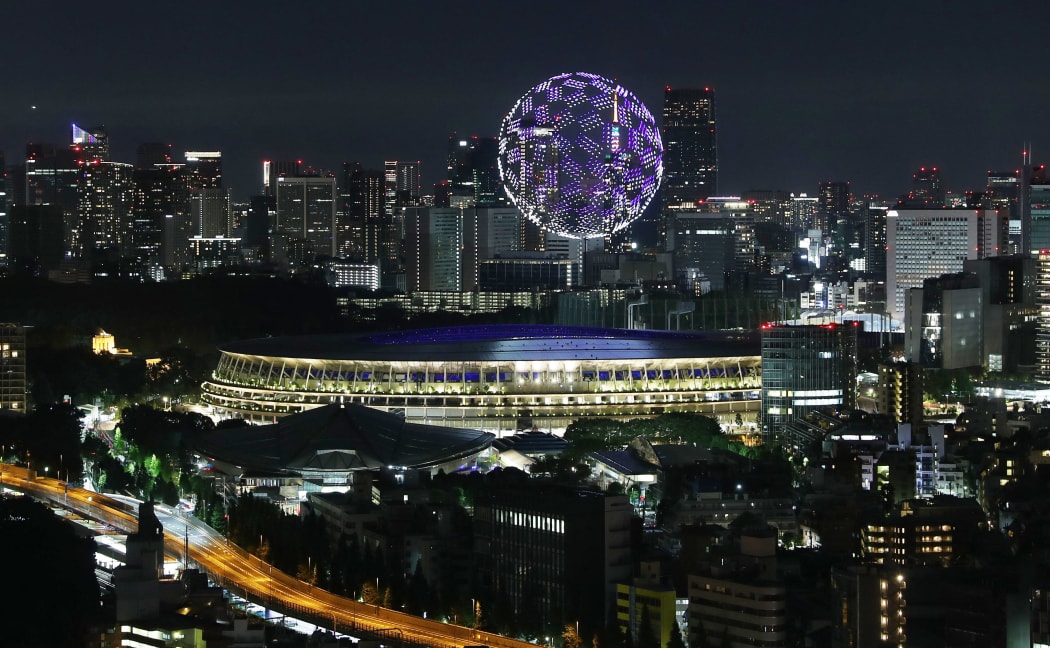 A photo shows a sphere made of drones during the Opening Ceremony of Tokyo 2020 Olympic Games at National Stadium in Tokyo on July 23, 2021.