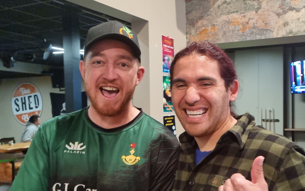 O'Shedigans bar owner Sean Davis, left, said the quarterfinal was very stressful to watch but the result was exciting.