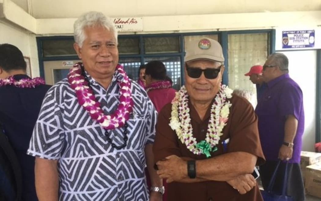 Chairman of the Board of the American Samoa Power Authority Fonoti Perelini 
(L) with American Samoa's Governor Lolo Moliga (R)