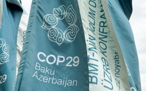 COP29 logo is seen in Baku, Azerbaijan on September 17, 2024. (Photo by Jakub Porzycki/NurPhoto) (Photo by Jakub Porzycki / NurPhoto / NurPhoto via AFP)