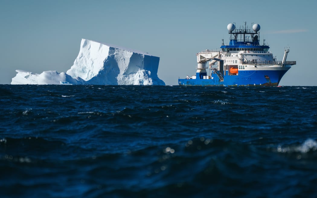 Research Vessel Falkor (too) maneuvers around icebergs while conducting research in  the Bellingshausen Sea off Antarctica.