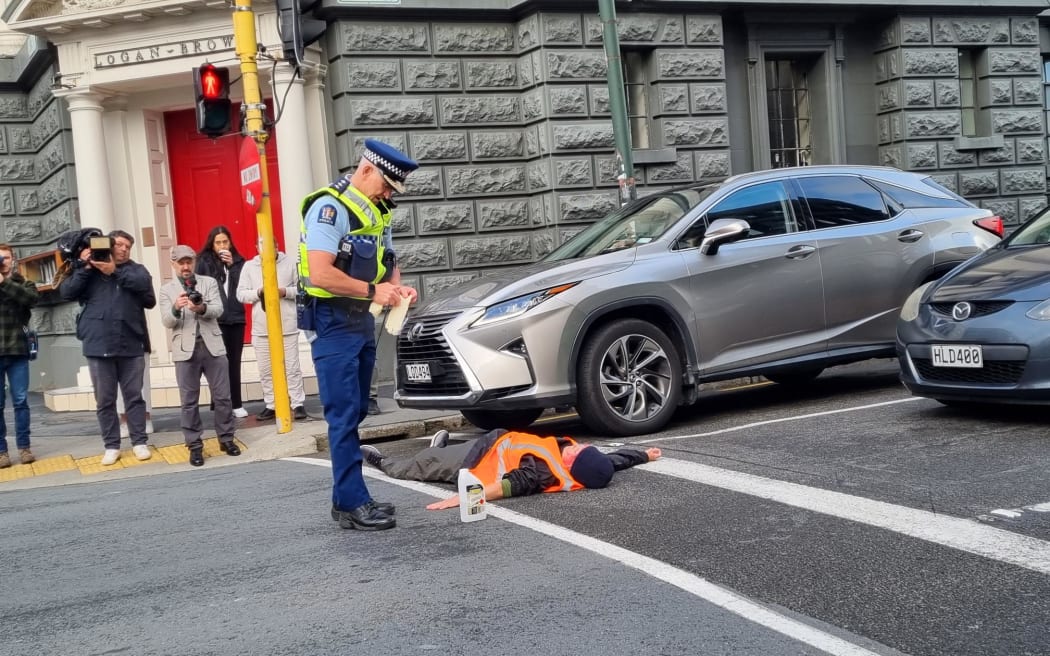 Restore Passenger Rail protesters blocked traffic at the intersection of Vivian and Cuba streets, Wellington, a rush hour on on Monday morning, 24 April 2023.