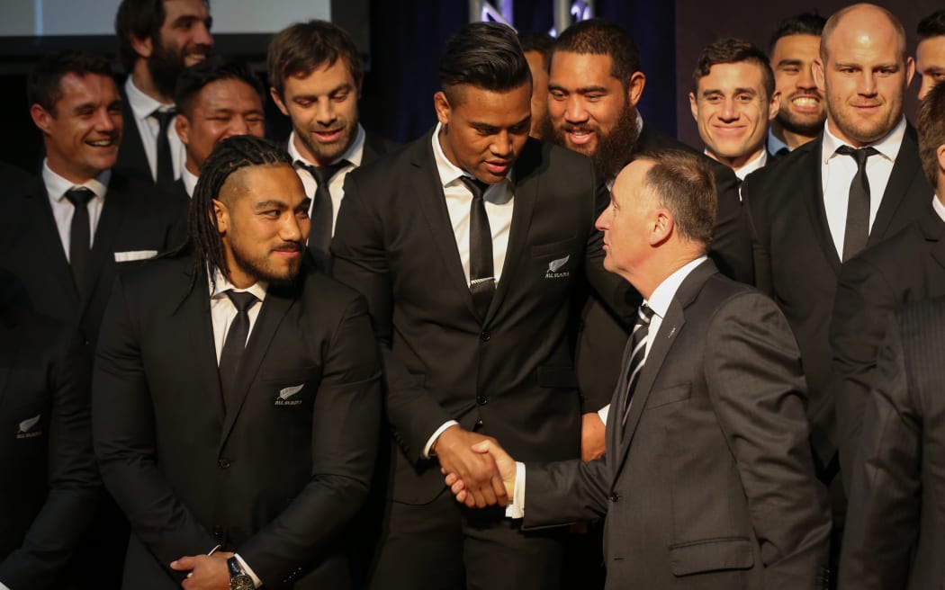 John Key congratulates squad members.