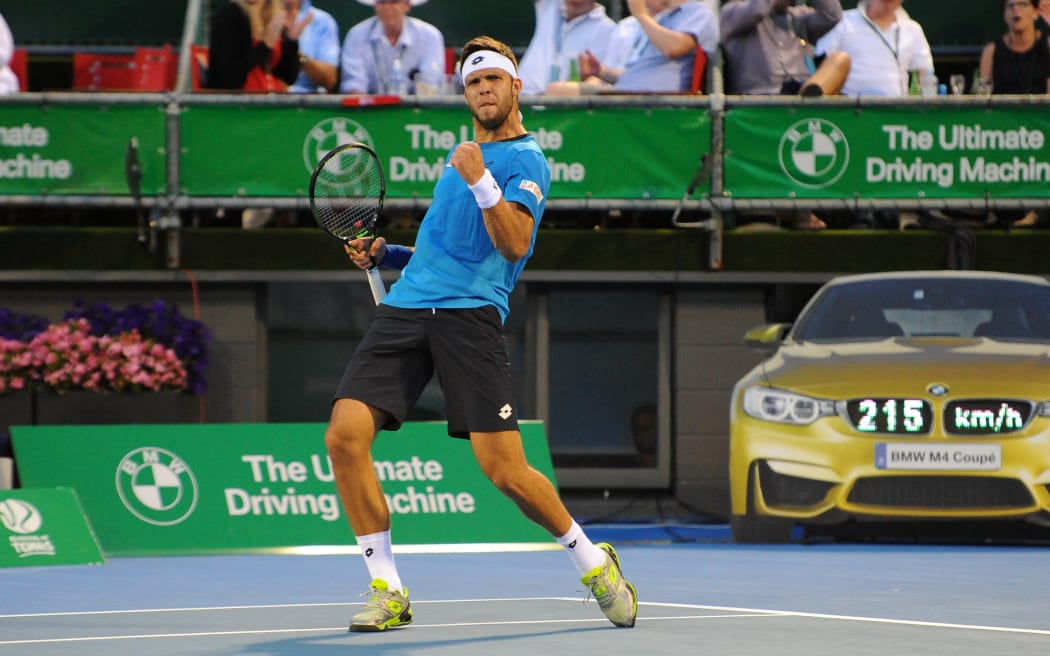 Jiří Veselý pumps his fist after beating Kevin Anderson to make the Auckland final
