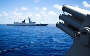 Crew members of China's South Sea Fleet take part in a logistics supply drill near the James Shoal area on South China Sea.
