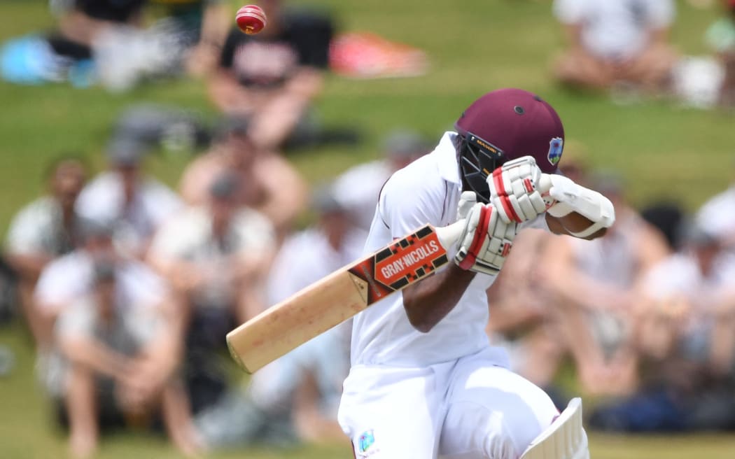 West Indies batsman Kraigg Brathwaite takes evasive action to a bouncer by Boult.
