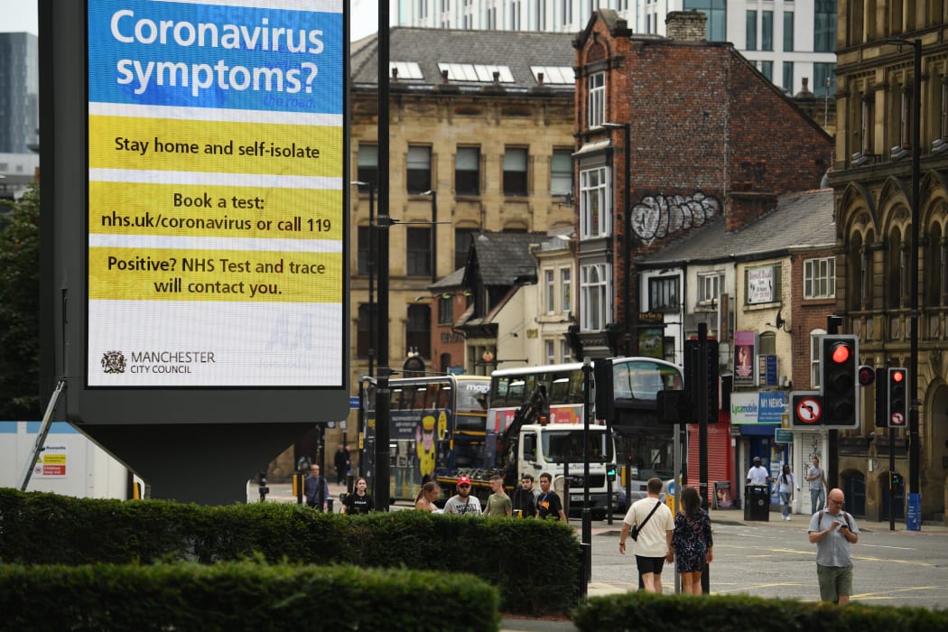 Billboard displays Covid-19 message in Manchester City.
