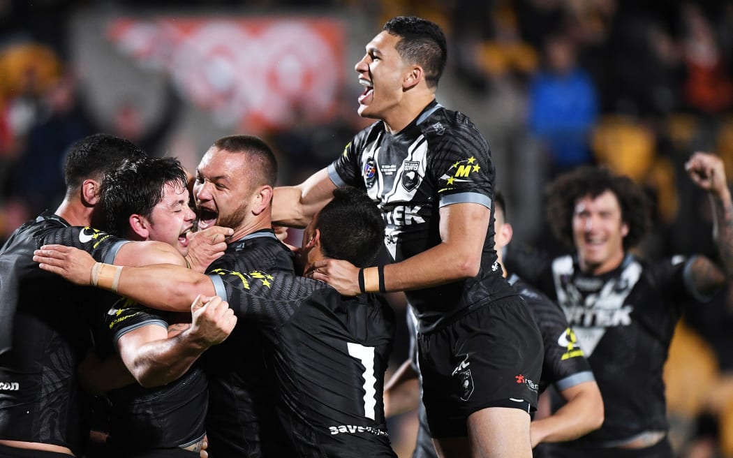 The Kiwis celebrate scoring during their last encounter against the Kangaroos, which New Zealand won 26-24.