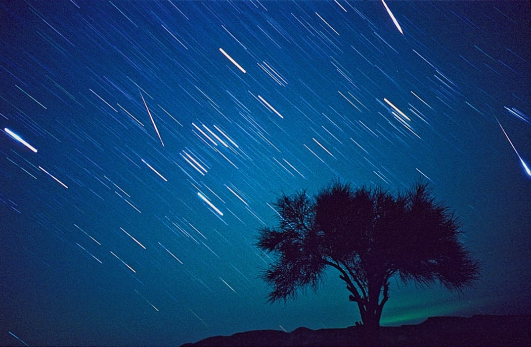 A 15 minute exposure captures the Leonid meteor shower in Kavir desert National Park, Iran in November 1999.