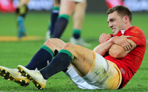 Lions' George North injures his shoulder during their clash with the Hurricanes.