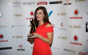 Janine & The Mixtape with her Tui award for Best Urban/Hip Hop album at the 2015 Vodafone New Zealand Music Awards.