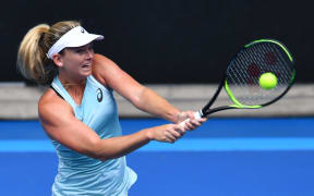 Coco Vandeweghe hits a return against Hungary's Timea Babos