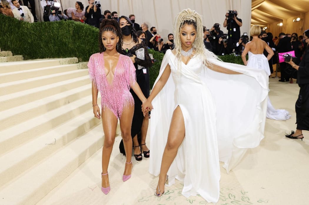 NEW YORK, NEW YORK - SEPTEMBER 13: Chloe Bailey and? Halle Bailey attend The 2021 Met Gala Celebrating In America: A Lexicon Of Fashion at Metropolitan Museum of Art on September 13, 2021 in New York City.