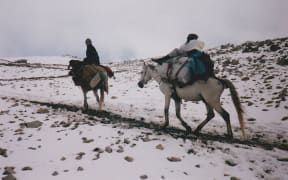 After the 9/11 attacks Neil and his family had to escape Afghanistan on horseback over the mountains.