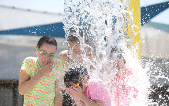 Heatwave hits Wellington as children cool off at McKenzie Baths, Petone.