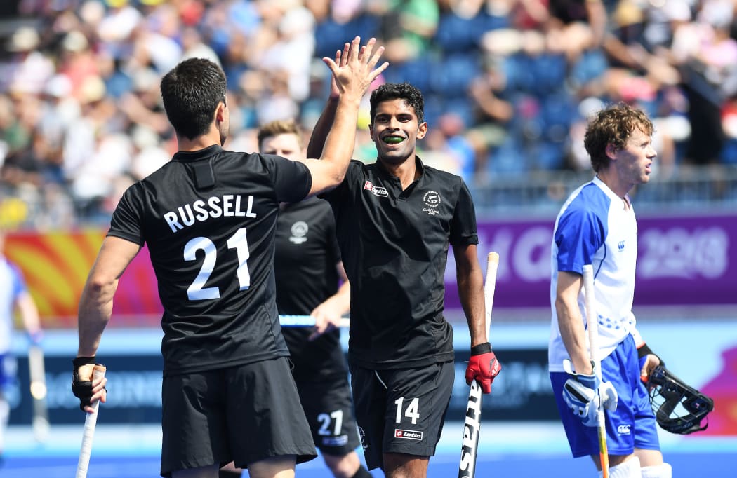 Kane Russell celebrates a goal with Jared Panchia.
New Zealand Black Sticks Men versus Scotland. Gold Coast Hockey Centre, 2018 Commonwealth Games, Gold Coast, Australia. Tuesday 10 April 2018. © Copyright photo: Andrew Cornaga / www.photosport.nz