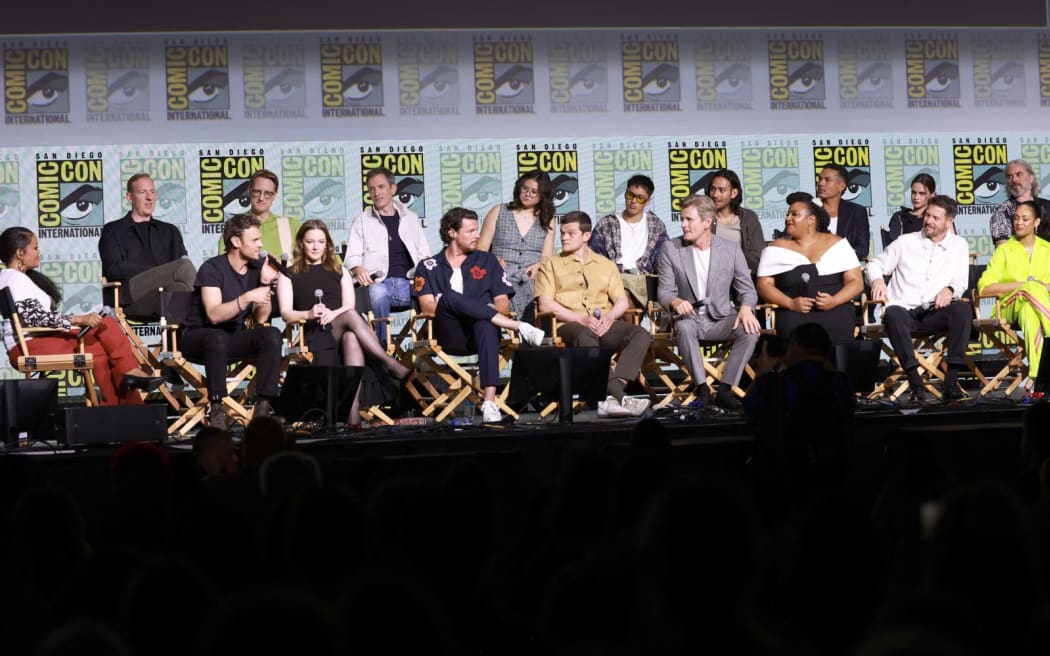 SAN DIEGO, CALIFORNIA - JULY 26: (L-R) Yvette Nicole Brown, Patrick Mckay, Charlie Vickers, JD Payne, Morfydd Clark, Daniel Weyman, Benjamin Walker, Megan Richards, Robert Aramayo, Tyroe Muhafidin, Charles Edwards, Maxim Baldry, Sophia Nomvete, Ismaël Cruz Córdova, Ema Horvath, Lloyd Owen, Trystan Gravelle and Cynthia Addai-Robinson speak onstage during 