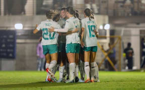 New Zealand Football Ferns players celebrate a goal