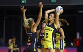Pulse midcourter Claire Kersten with possession of the ball