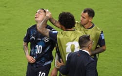 Paraguay squad members console Miguel Almiron after he was given a red card for covering his mouth while talking to another player during the FIFA World Cup 2026 Group D match against Turkey in San Francisco, June 19, 2026. (Photo by Stu Forster / GETTY IMAGES NORTH AMERICA / Getty Images via AFP)