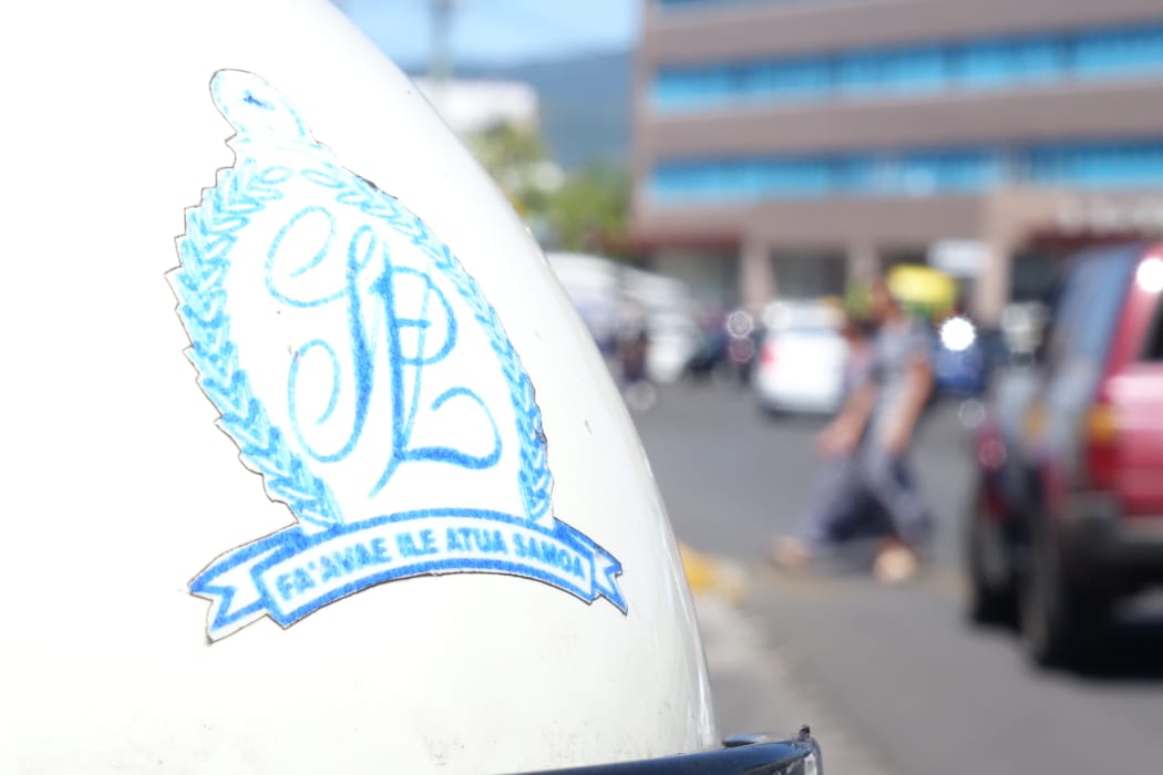 The Samoa Police crest on a patrol bike in downtown Apia.