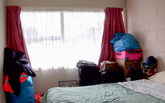 Families take what can with them to emergency housing in a motel at $190 per night