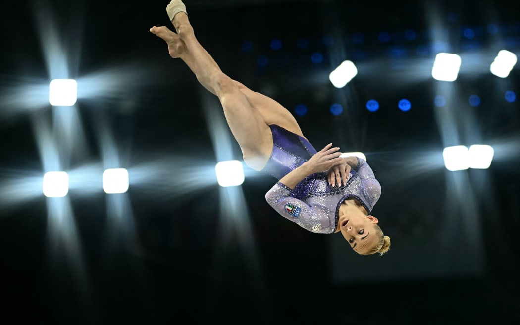 Italy's Alice D'amato competes in the artistic gymnastics women's balance beam final during the Paris 2024 Olympic Games at the Bercy Arena in Paris, on August 5, 2024. (Photo by Loic VENANCE / AFP)