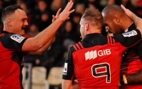 The Crusaders celebrate a try against the Rebels, 2016.