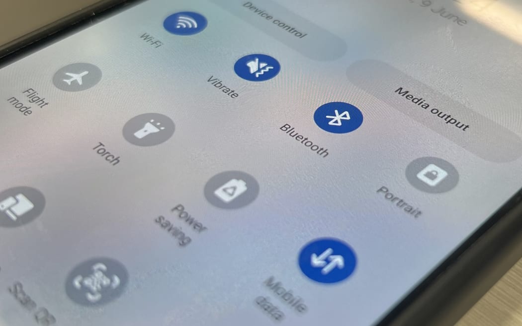 Bluetooth symbol on smartphone screen